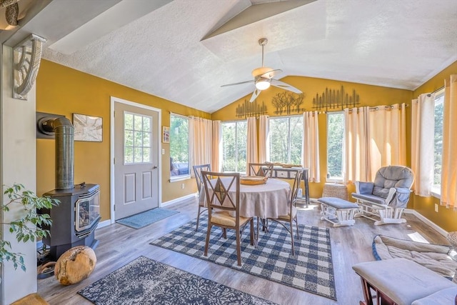 159 School St, Granby, MA 01033 - dining space with plenty of natural light, vaulted ceiling, wood finished floors, ceiling fan, and a textured ceiling