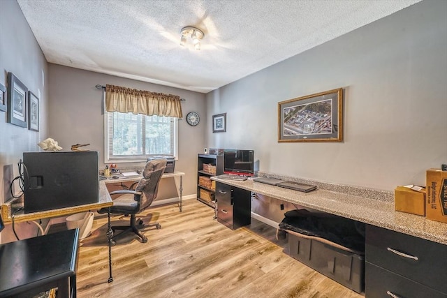 159 School St, Granby, MA 01033 - office space with a textured ceiling and light wood-style flooring