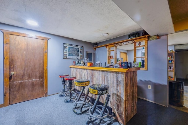 159 School St, Granby, MA 01033 - indoor bar featuring carpet, a textured ceiling, and baseboards