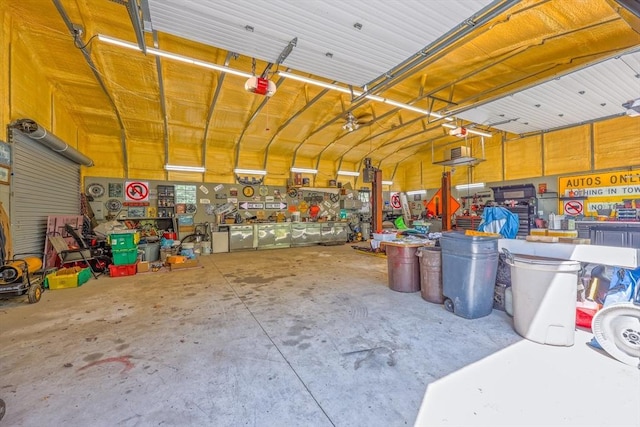 159 School St, Granby, MA 01033 - garage with a garage door opener and a workshop area