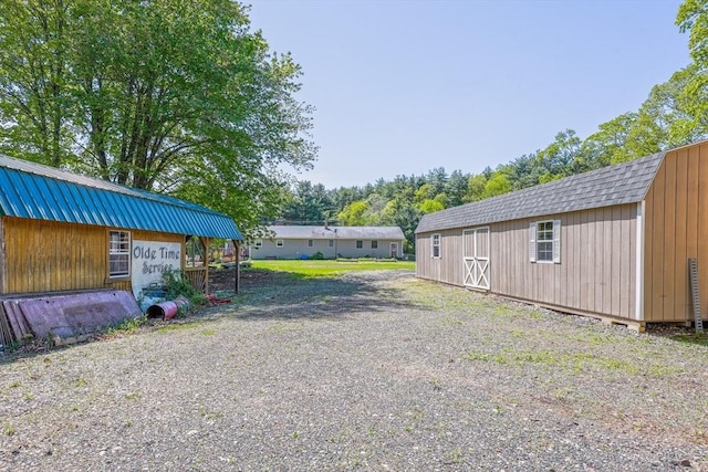 159 School St, Granby, MA 01033 - view of yard with an outdoor structure and a shed