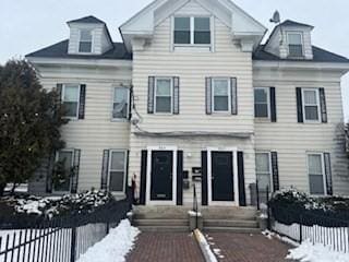 view of front of home with fence