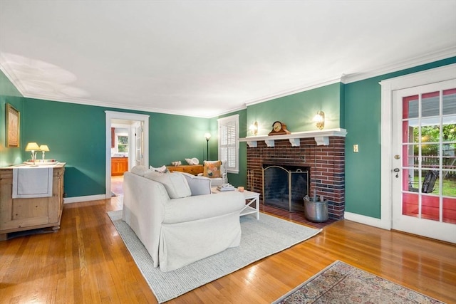 9 Palmer Rd, Marblehead, MA 01945 - living area featuring healthy amount of natural light, wood finished floors, and crown molding