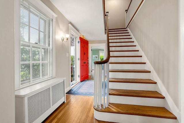 9 Palmer Rd, Marblehead, MA 01945 - staircase featuring radiator and hardwood / wood-style floors