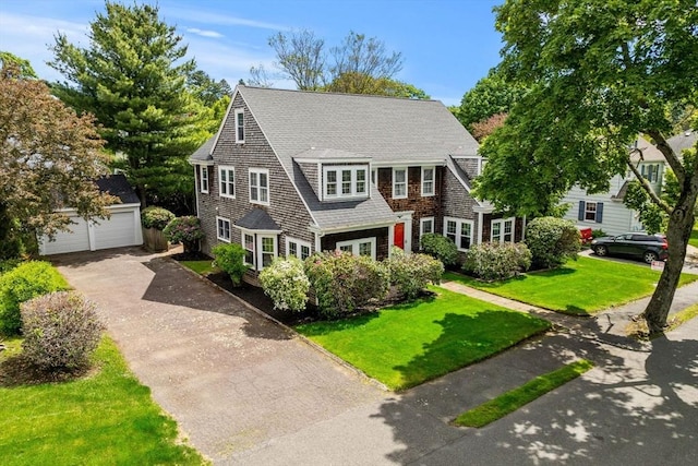 9 Palmer Rd, Marblehead, MA 01945 - shingle-style home featuring an outdoor structure, a garage, a front yard, and roof with shingles