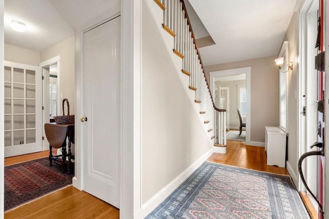 9 Palmer Rd, Marblehead, MA 01945 - entrance foyer with wood finished floors, stairs, and baseboards