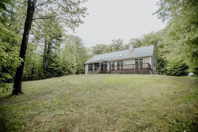 251 Butterworth Rd, Barre, MA 01005 - back of property with a deck, a chimney, and a lawn