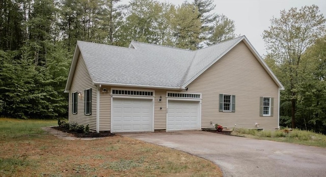 251 Butterworth Rd, Barre, MA 01005 - view of front of house with a garage, driveway, and a shingled roof