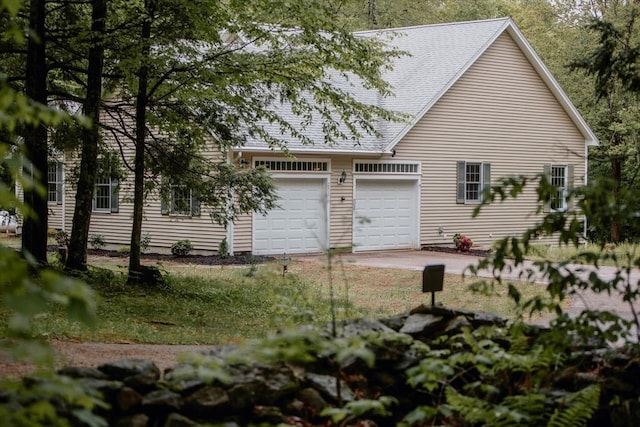 251 Butterworth Rd, Barre, MA 01005 - view of side of home with a garage, roof with shingles, and concrete driveway