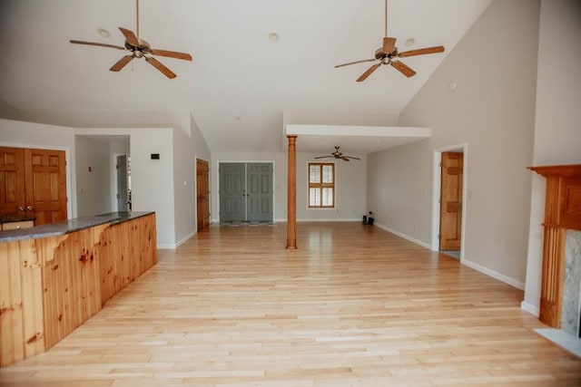 251 Butterworth Rd, Barre, MA 01005 - unfurnished living room featuring a ceiling fan, light wood finished floors, and high vaulted ceiling