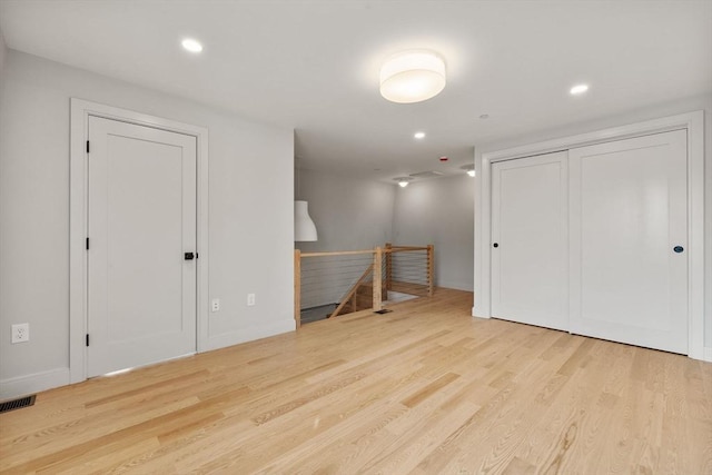 88 Maverick St Unit 3, Boston, MA 02128 - basement featuring wood finished floors and recessed lighting