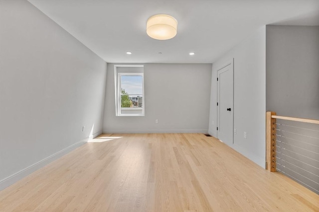 88 Maverick St Unit 3, Boston, MA 02128 - empty room with light wood finished floors and recessed lighting