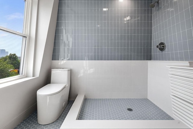 88 Maverick St Unit 3, Boston, MA 02128 - bathroom with a tile shower and tile walls