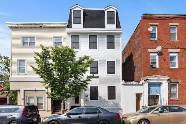 88 Maverick St Unit 3, Boston, MA 02128 - view of property featuring mansard roof and roof with shingles