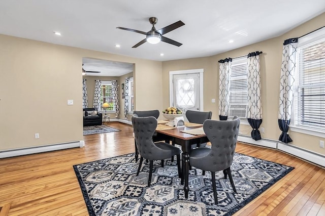 16 Pacific St, Lynn, MA 01902 - dining room featuring a ceiling fan, a baseboard radiator, wood-type flooring, and recessed lighting