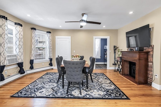 16 Pacific St, Lynn, MA 01902 - dining room with hardwood / wood-style floors, a fireplace, cooling unit, a ceiling fan, and recessed lighting