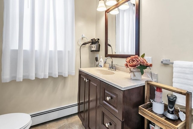 16 Pacific St, Lynn, MA 01902 - bathroom with baseboard heating and vanity