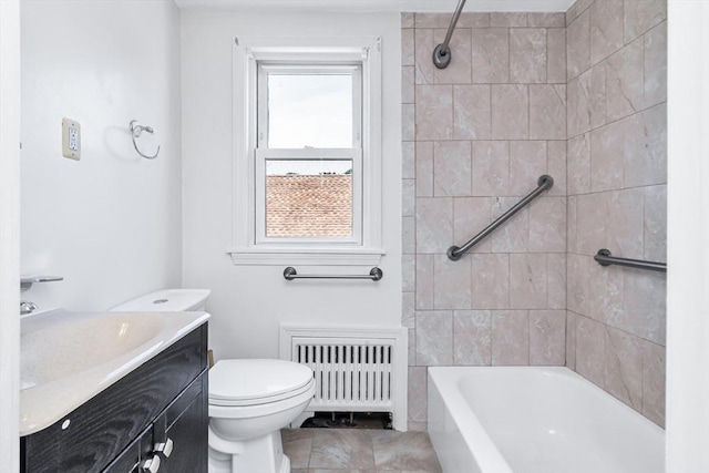 16 Pacific St, Lynn, MA 01902 - full bathroom with radiator heating unit, vanity, and tile patterned floors