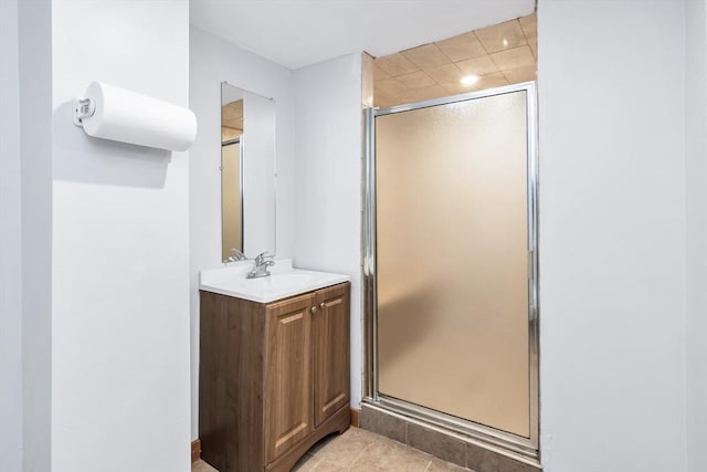 16 Pacific St, Lynn, MA 01902 - bathroom featuring a stall shower, vanity, tile patterned flooring, and recessed lighting