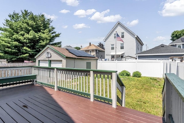 16 Pacific St, Lynn, MA 01902 - deck with an outbuilding, a fenced backyard, a residential view, and a detached garage