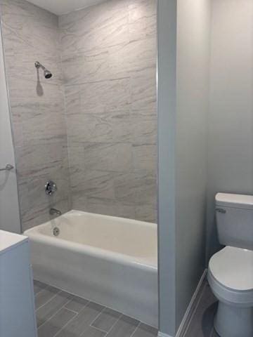 404 Brayton Ave, Fall River, MA 02721 - bathroom featuring washtub / shower combination, tile patterned floors, and vanity