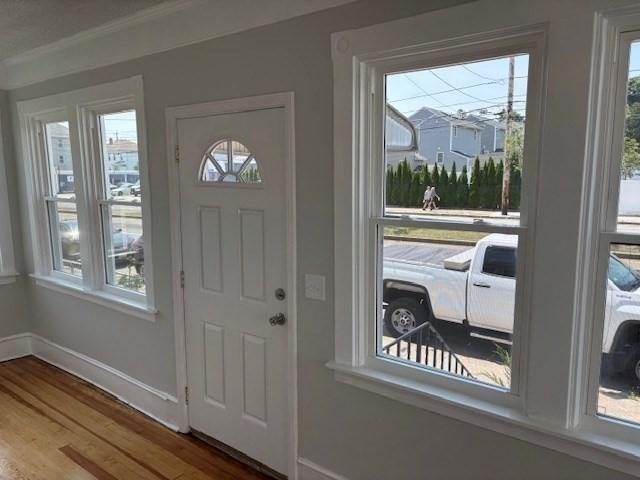 404 Brayton Ave, Fall River, MA 02721 - entryway with wood finished floors and crown molding