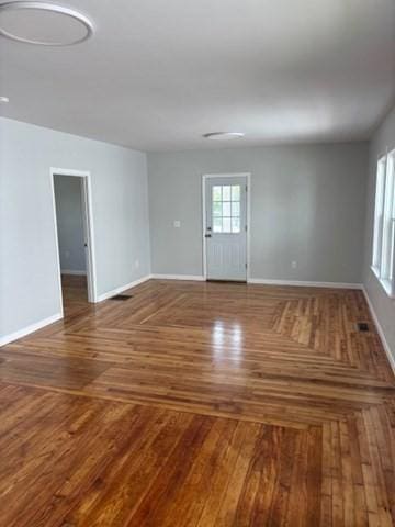 404 Brayton Ave, Fall River, MA 02721 - spare room with baseboards and parquet flooring