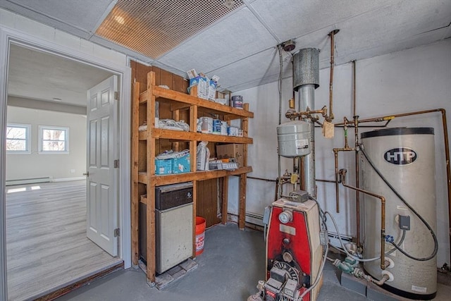 utility room with a baseboard heating unit, water heater, and a heating unit