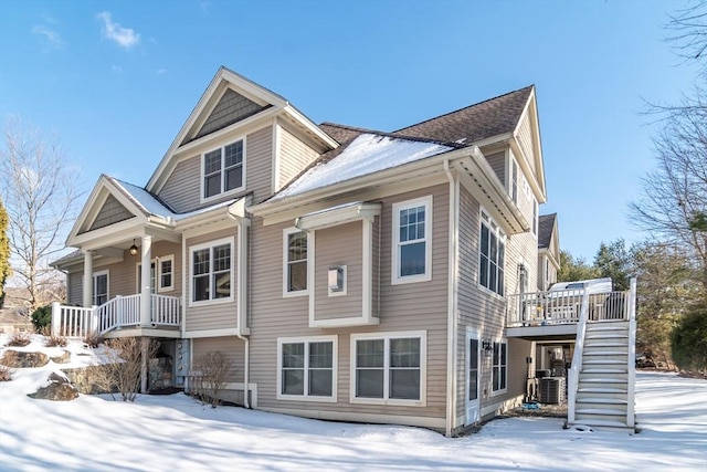 view of front of home featuring cooling unit and a wooden deck