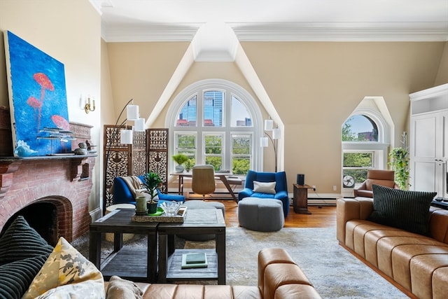 living room with ornamental molding, a fireplace, light hardwood / wood-style floors, and a healthy amount of sunlight