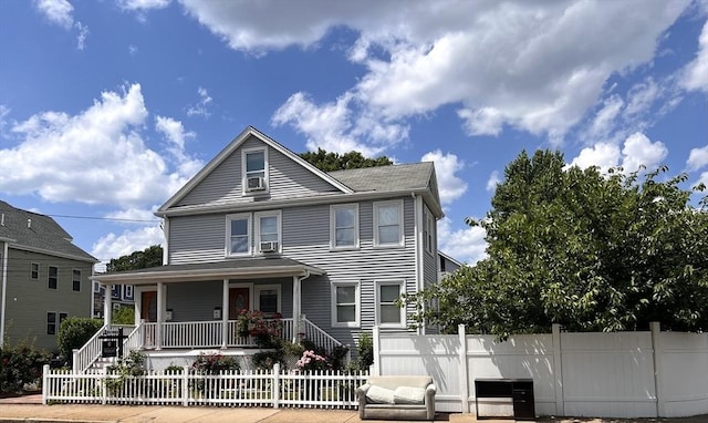 31-33 Harvard St, Medford, MA 02155 - view of front of home with a porch and a fenced front yard