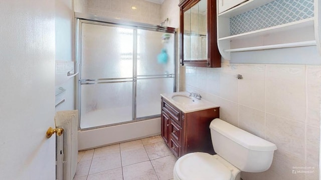 31-33 Harvard St, Medford, MA 02155 - bathroom featuring vanity, combined bath / shower with glass door, and tile patterned flooring