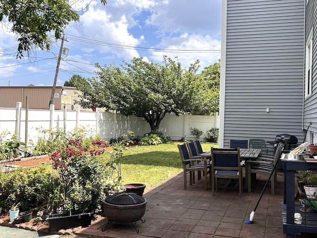 31-33 Harvard St, Medford, MA 02155 - fenced backyard with a patio area and outdoor dining space