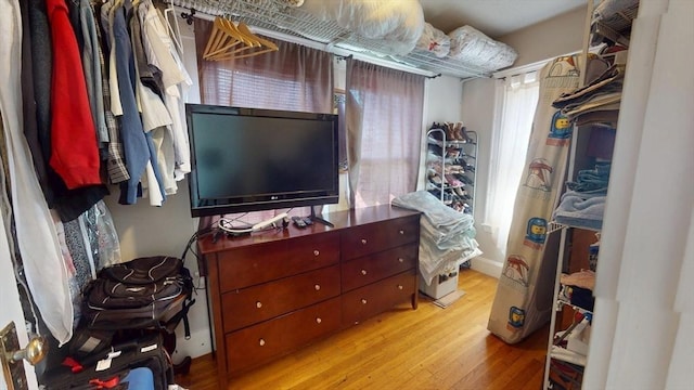31-33 Harvard St, Medford, MA 02155 - walk in closet featuring wood finished floors