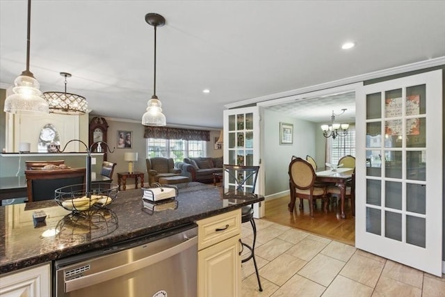 544 Main St, Stoneham, MA 02180 - kitchen featuring stainless steel dishwasher, crown molding, baseboards, pendant lighting, and a chandelier