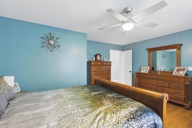 544 Main St, Stoneham, MA 02180 - bedroom with wood finished floors and ceiling fan