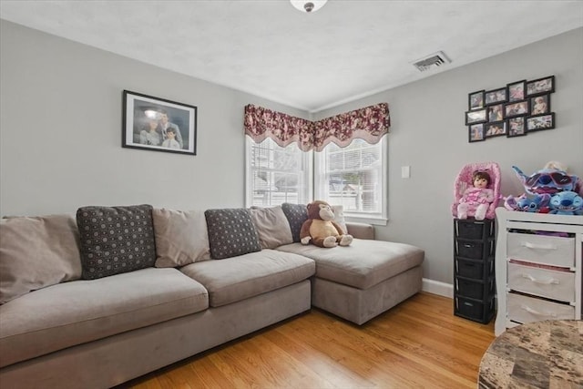 544 Main St, Stoneham, MA 02180 - living area with light wood-style flooring and baseboards