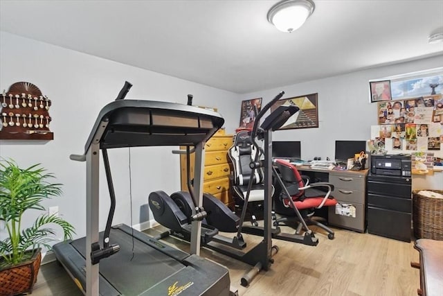 544 Main St, Stoneham, MA 02180 - workout room with light wood-style flooring