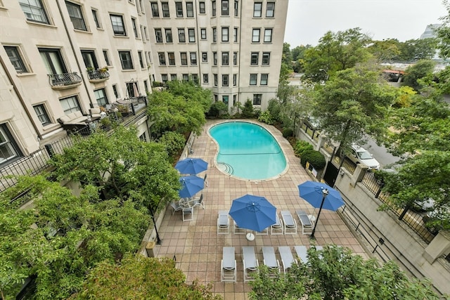 view of swimming pool with a patio area