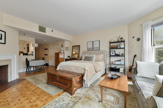 bedroom featuring parquet floors