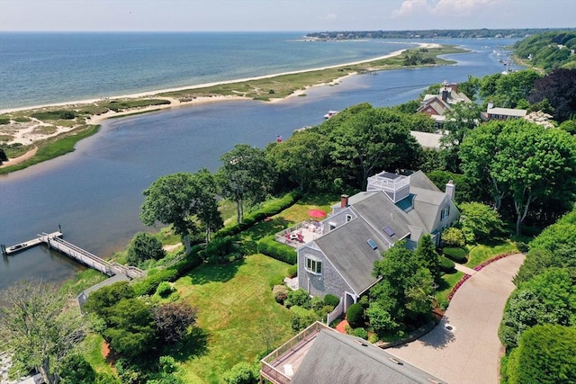 bird's eye view featuring a water view and a view of the beach