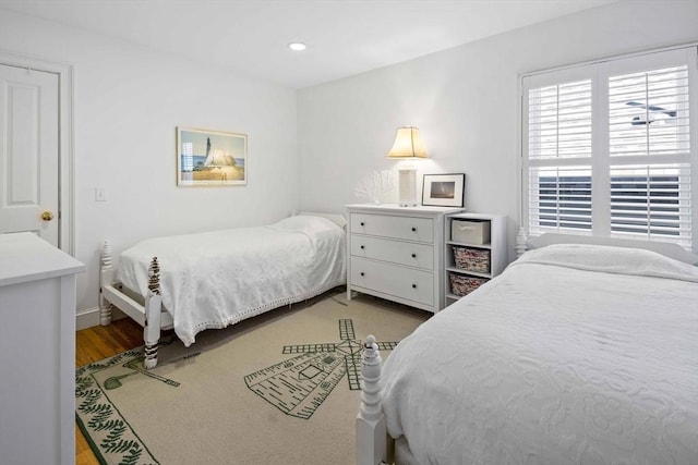 bedroom featuring wood-type flooring