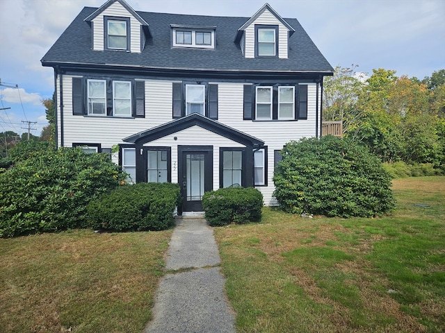 view of front of home featuring a front yard