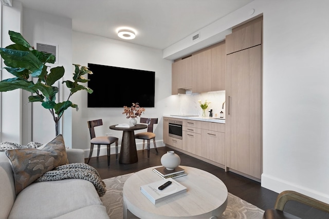 living room with dark wood-type flooring