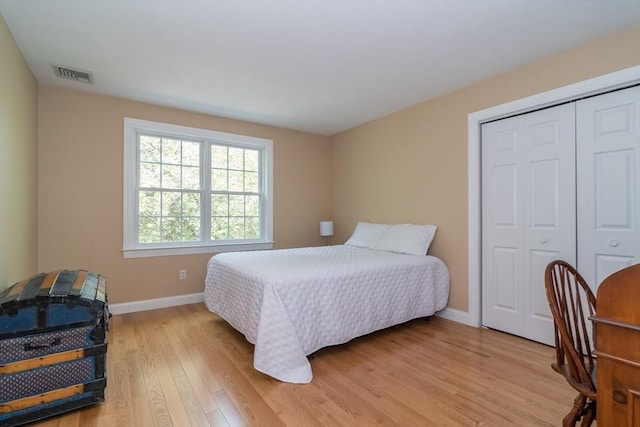 5 Warner Way, Canton, MA 02021 - bedroom with baseboards, light wood-type flooring, and a closet