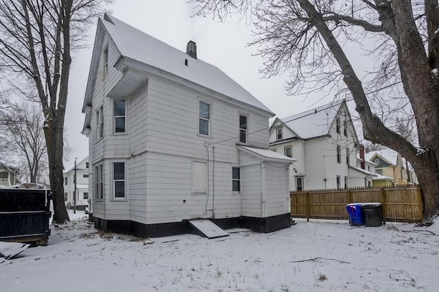 view of snow covered property