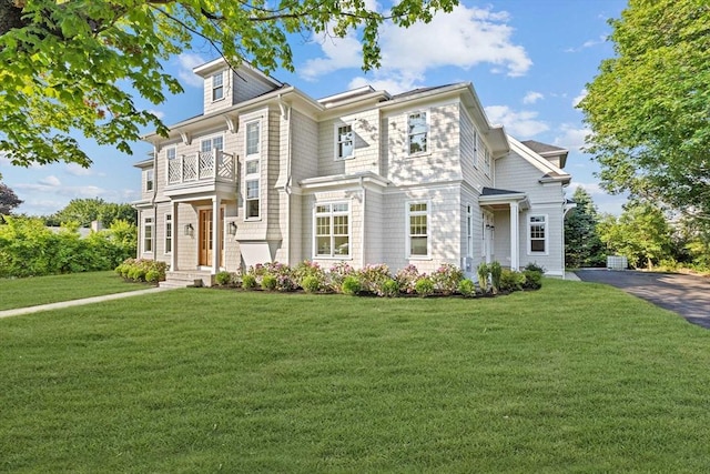 16 Foley Beach Rd, Hingham, MA 02043 - view of front of home featuring a balcony and a front lawn