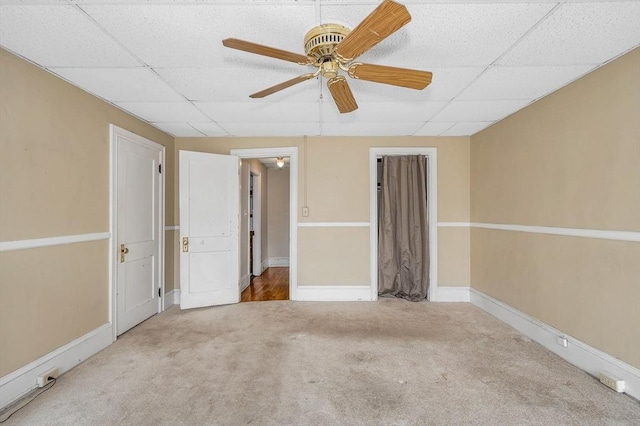 89 Merrill Ave, Lowell, MA 01850 - unfurnished bedroom with a drop ceiling, carpet, baseboards, and ceiling fan