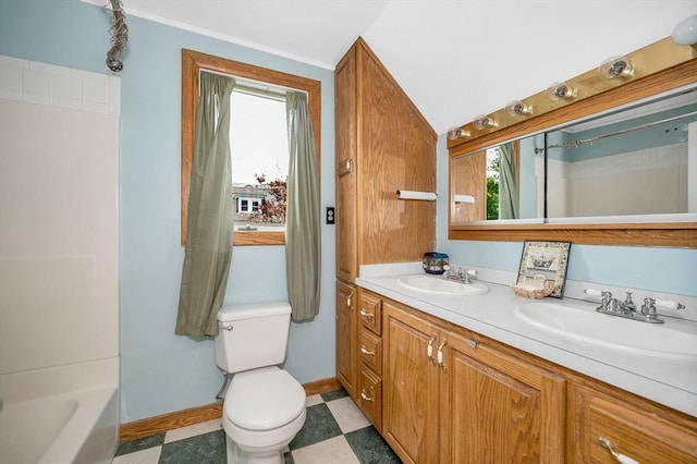 89 Merrill Ave, Lowell, MA 01850 - bathroom featuring plenty of natural light, double vanity, baseboards, and toilet