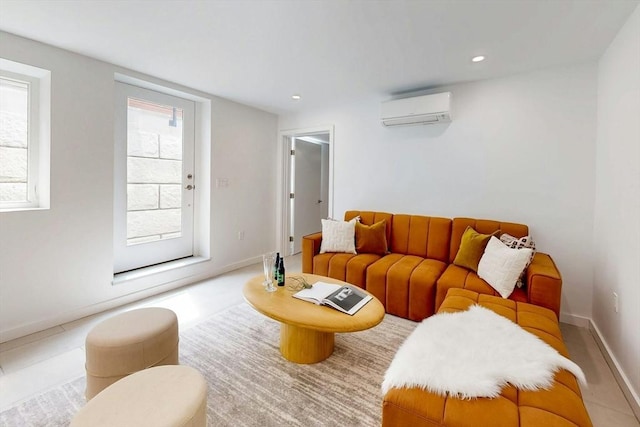 living room with a wall mounted AC, baseboards, and recessed lighting